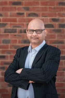 The portrait of Pavan Madduru, the founder and CEO of Silence Speaks.