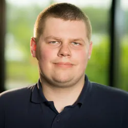 The portrait of Robert Tiffert, Deaf Chief Operating Officer.